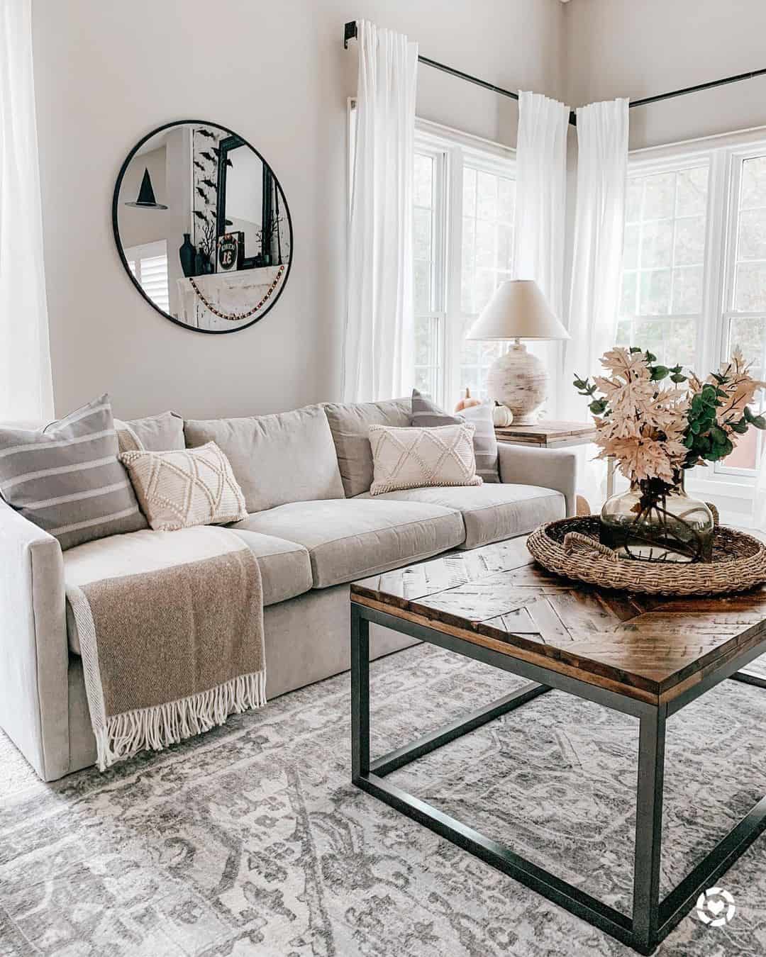 Round Mirror Doubles Impact of Seasonal Mantel Decor