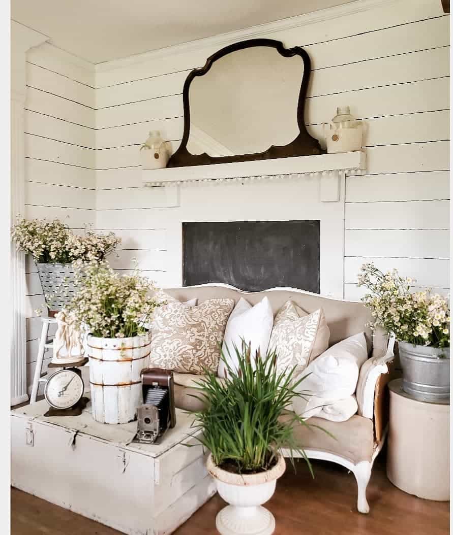 Ornate Mirror Creates Drama Above Shiplap Fireplace