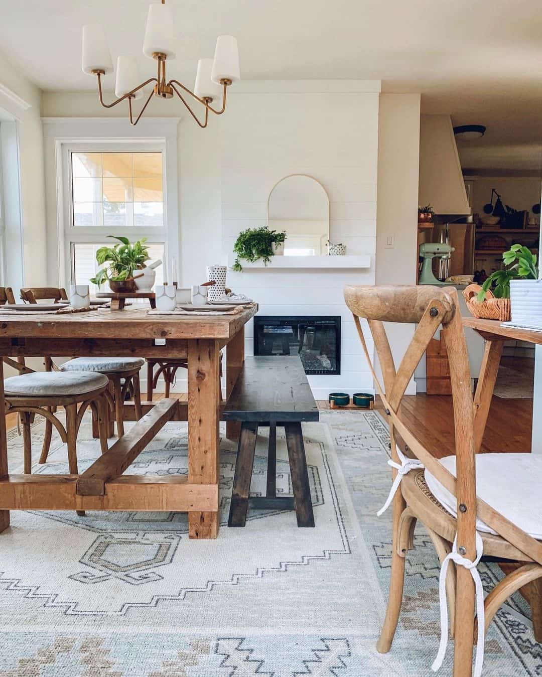 Arched Mirror Adds a Soft Touch Above a Shiplap Mantel
