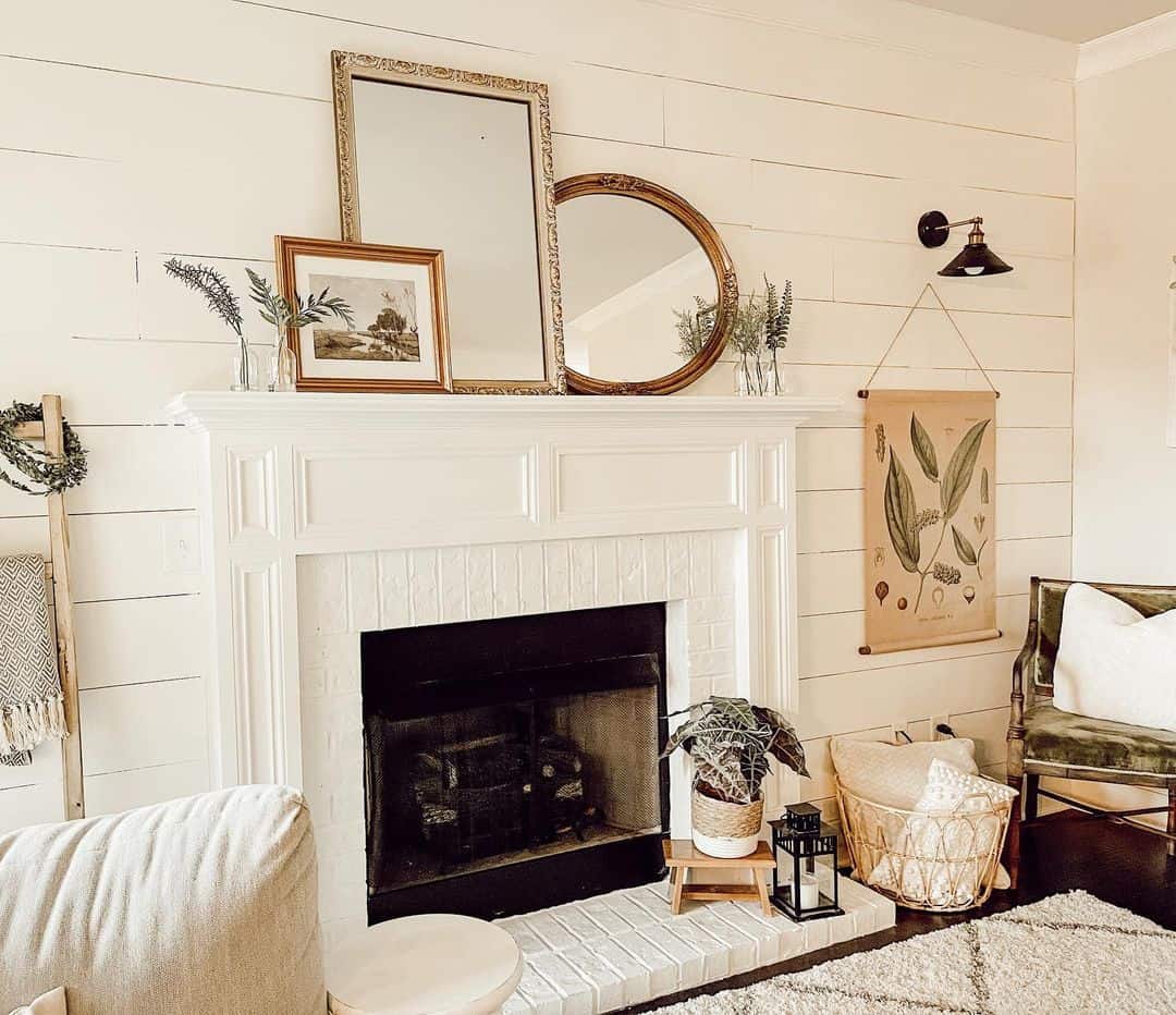 Layered Gold Mirrors Frame a Landscape Artwork