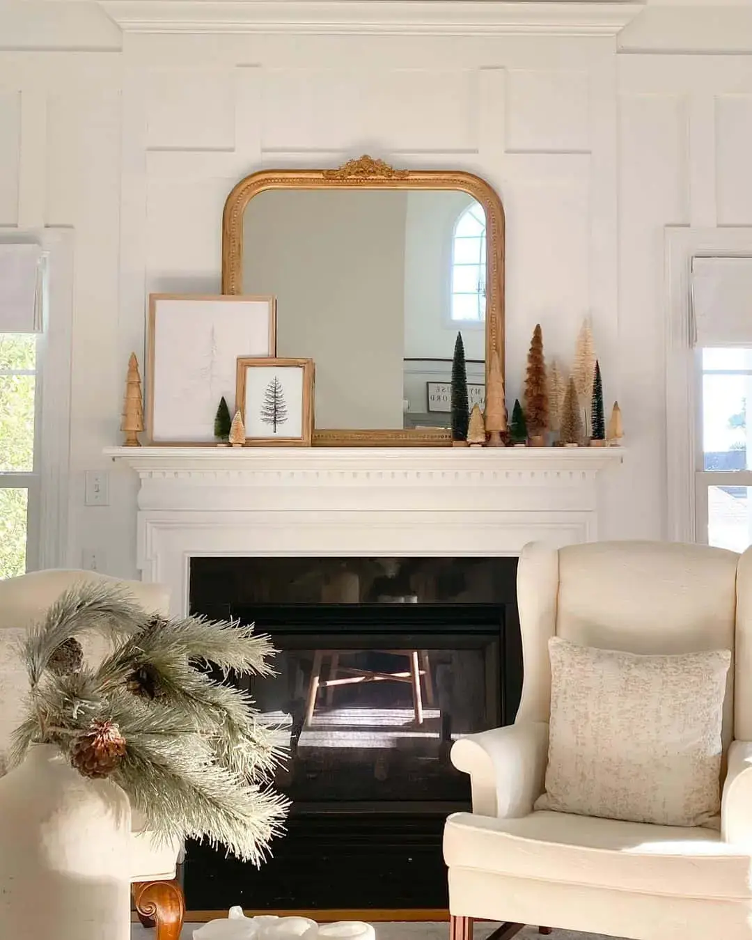 Gold Mirror Frames a Whimsical Forest of Miniature Trees