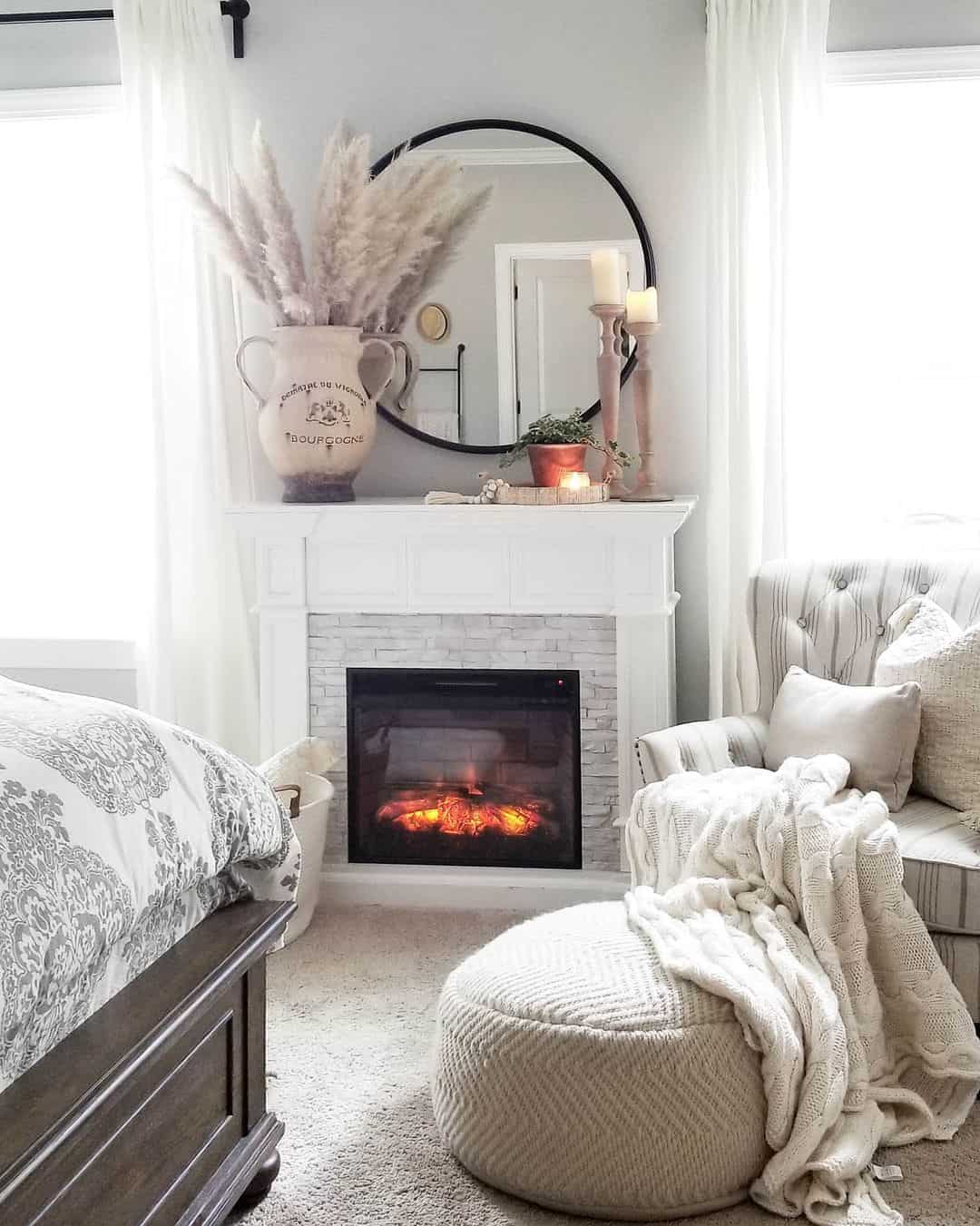 Round Mirror with Black Frame Adds Depth Above Fireplace