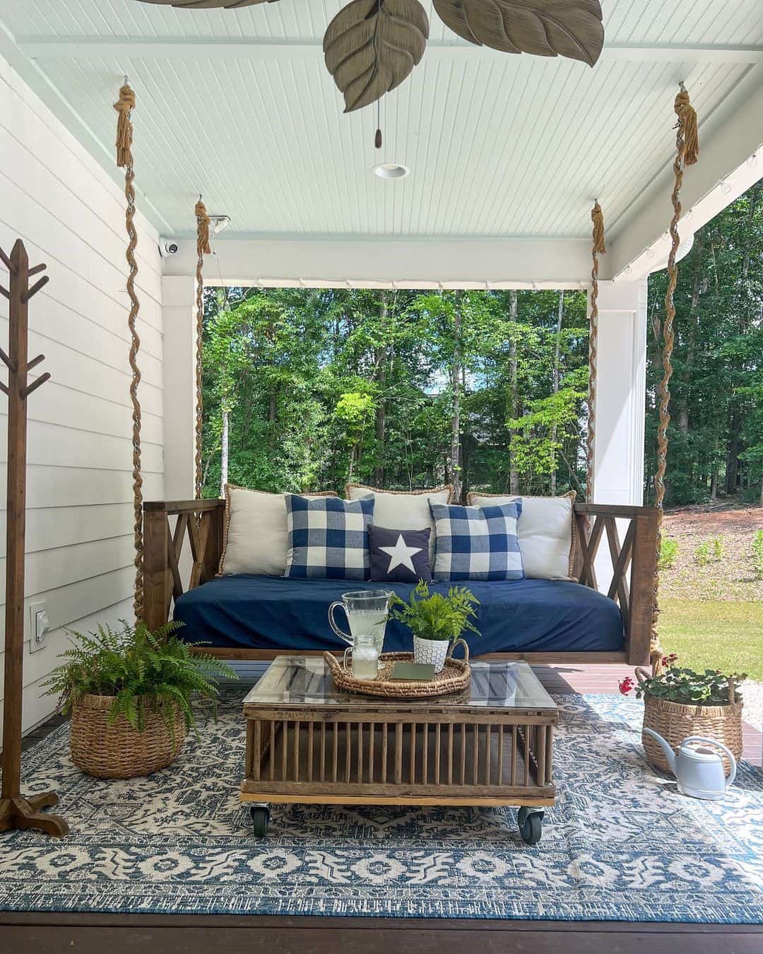 Rustic Coffee Table Holds a Tray and Potted Greenery