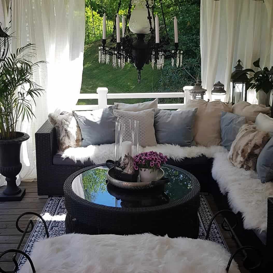 Anchor Your Seating with a Layered Round Coffee Table Display