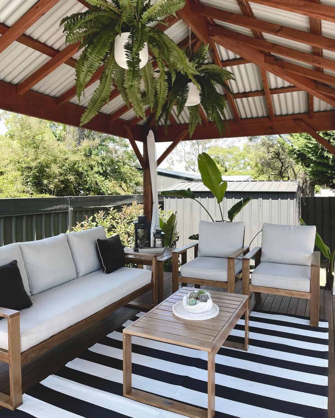Hanging Ferns Soften a Covered Patio