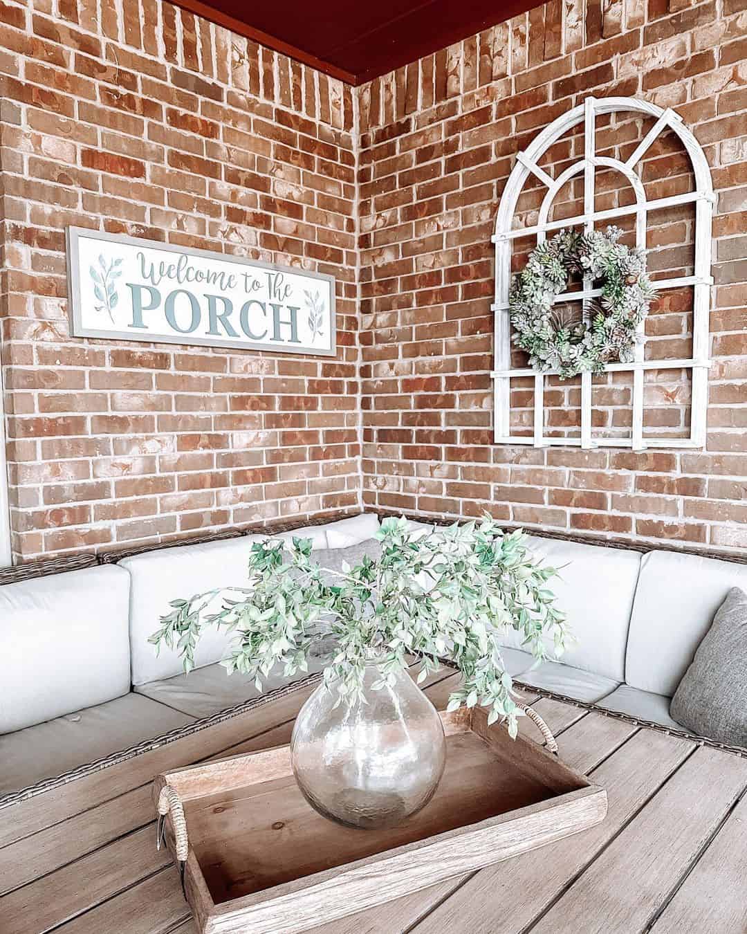 Wooden Tray Grounds a Vase of Greenery