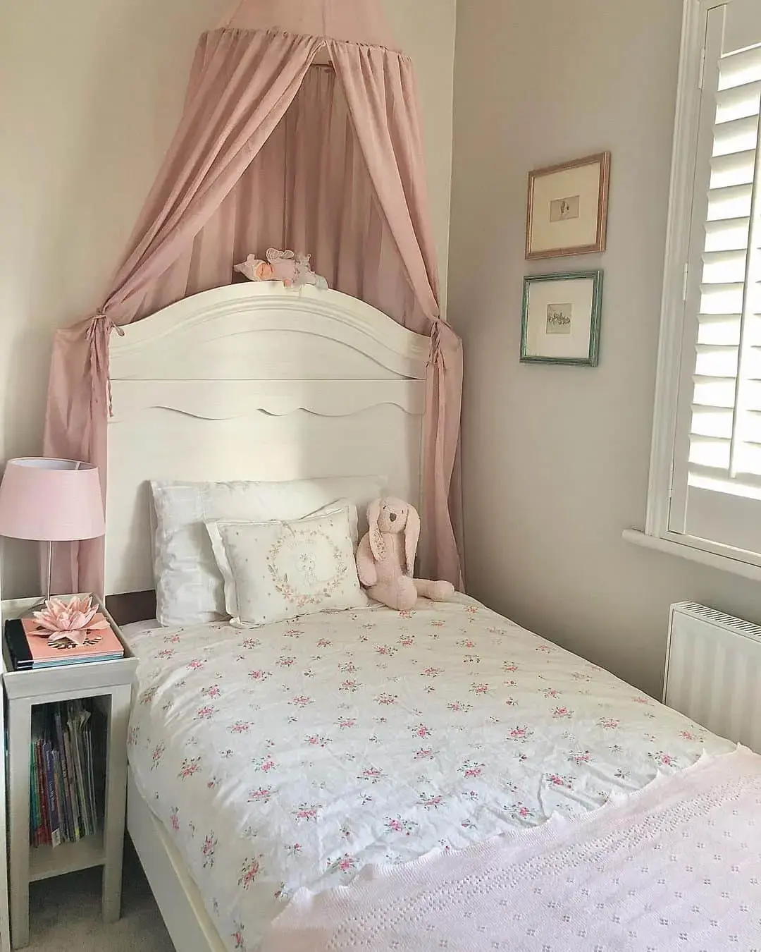 Canopy drapes create a cozy bed nook