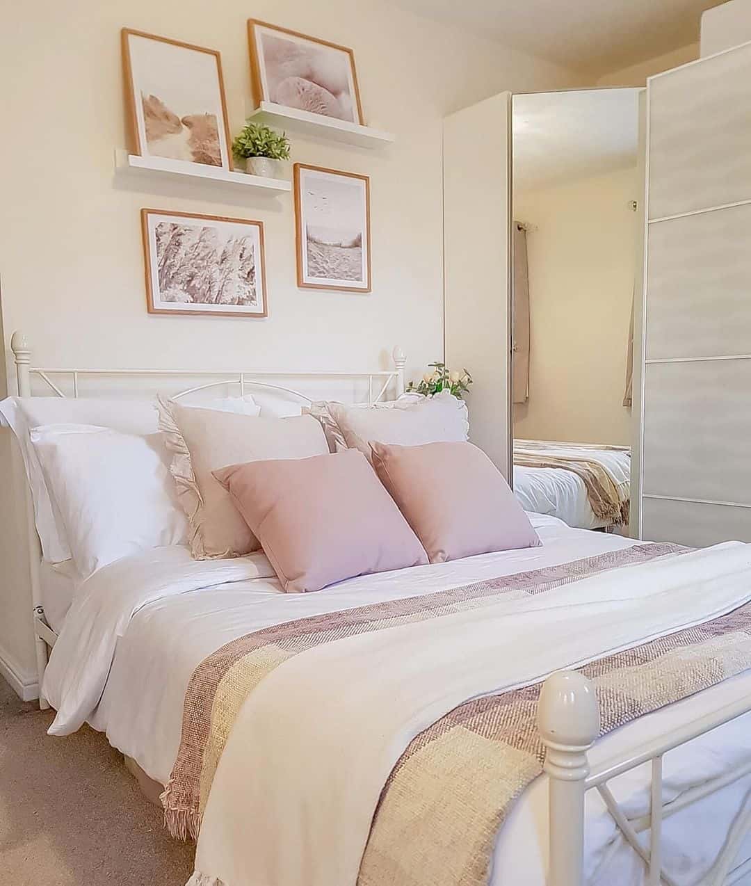 Floating shelves display art above your bed