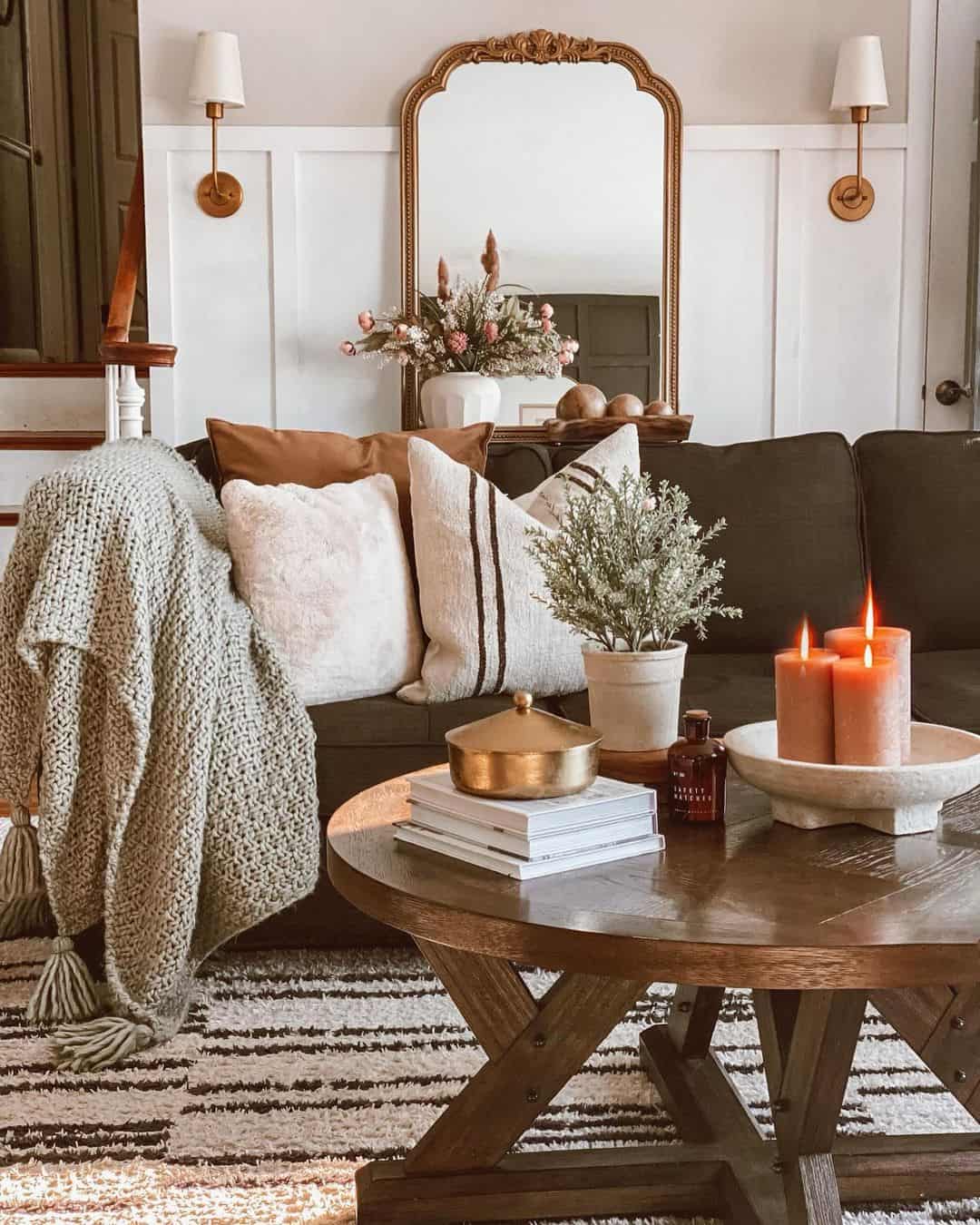 Stacked Books and a Brass Lidded Jar Create a Layered Look