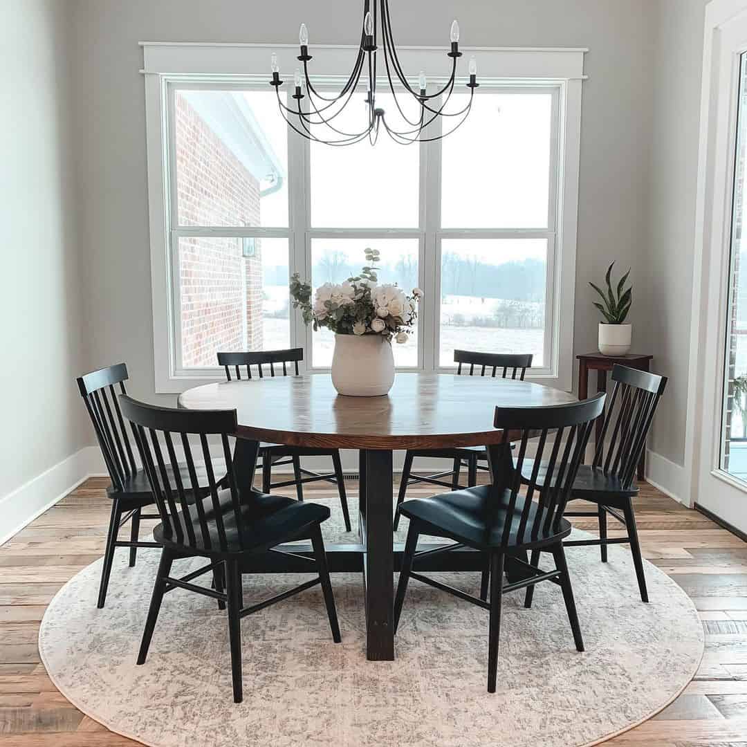 Ground Your Dark Wood Table With a Light-Toned Patterned Rug