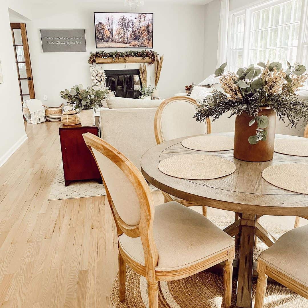 Round Dining Table with Textured Jute Rug Underneath