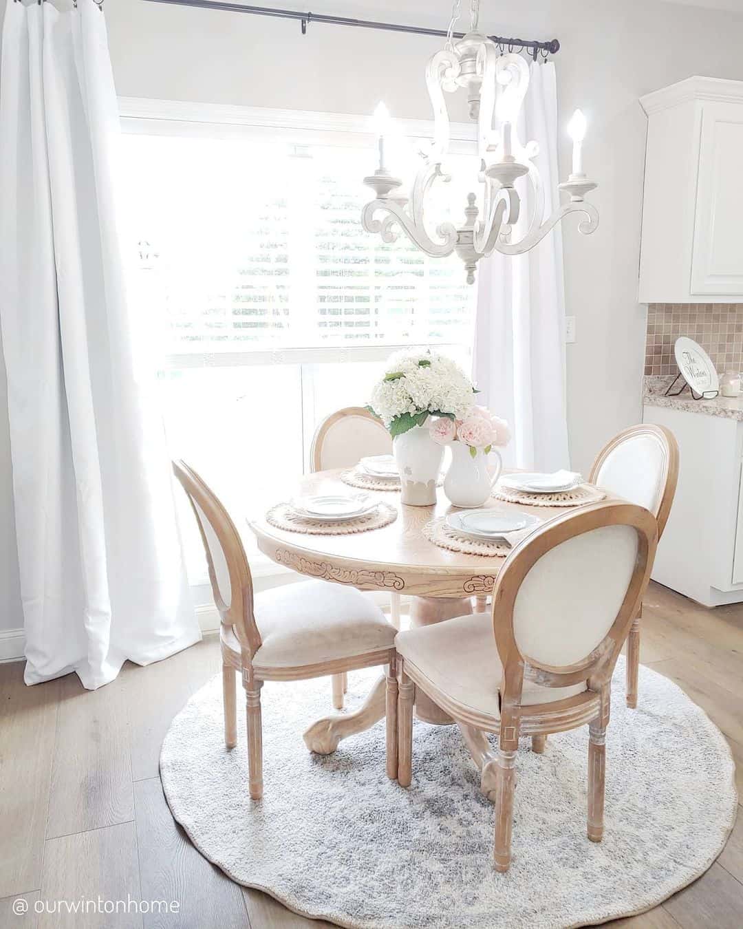 Frame Your Light Wood Table With a Light Blue Patterned Rug