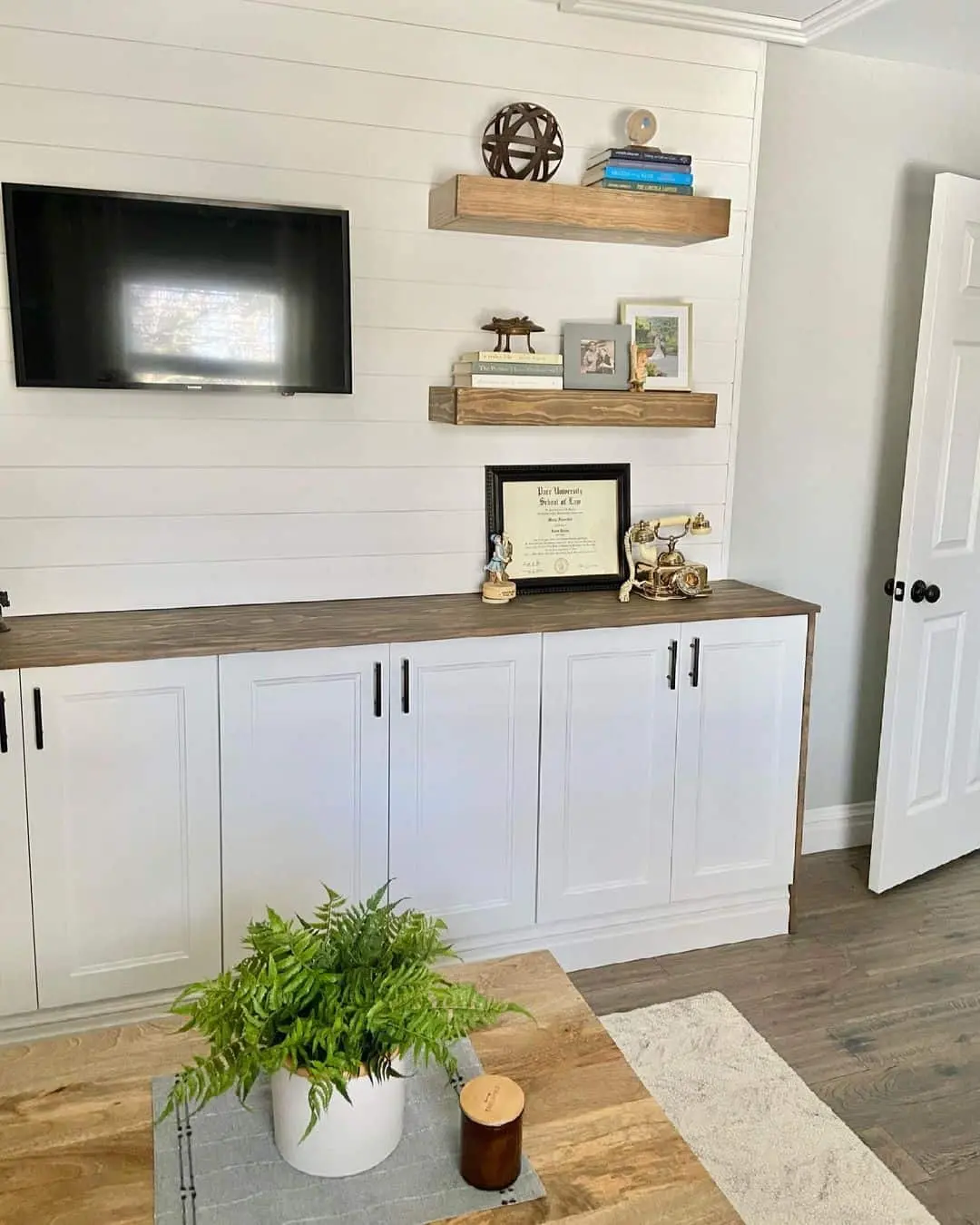 Wooden Shelves Display Framed Photos and Decorative Objects