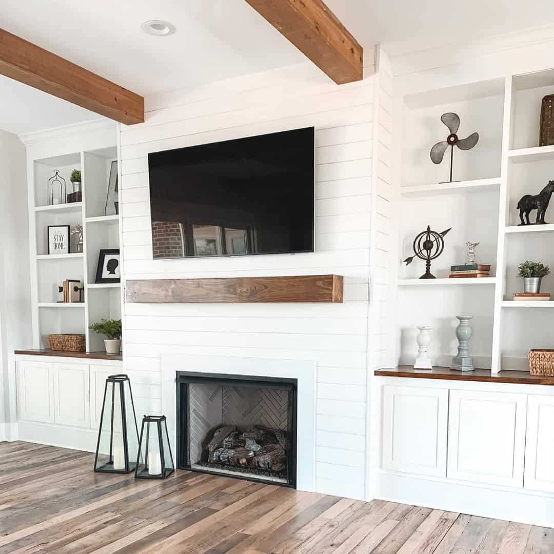 Dark Wood Mantel Anchors TV on White Shiplap