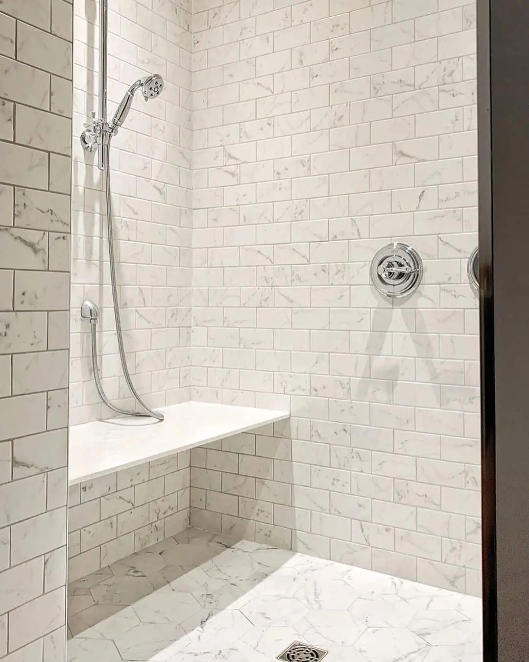 Incorporate a Built-In Bench with Marble Subway Tile Walls
