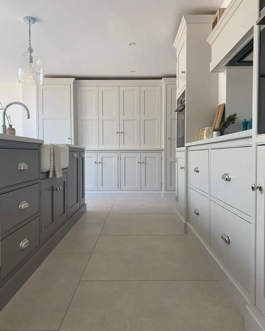 Gray Island Cabinets with Polished Nickel Bin Pulls