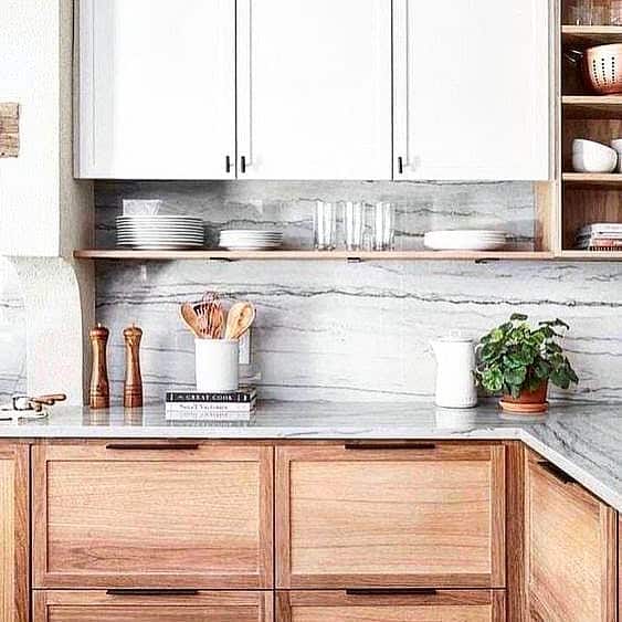 Warm Wood Base Cabinets Complement White Upper Units