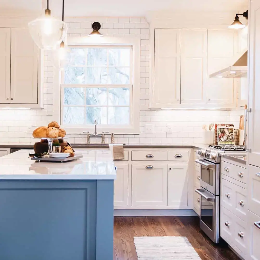 Dusty Blue Island Cabinets with Silver Bin Pulls
