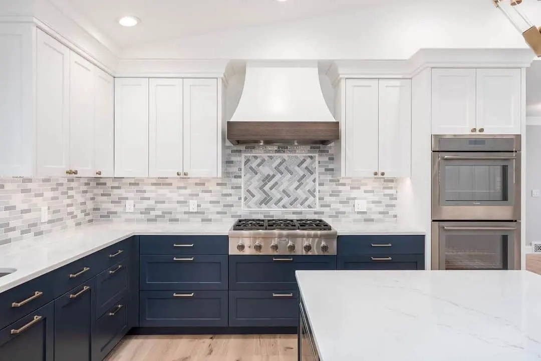 Ground Your Bright White Kitchen with Navy Base Cabinets