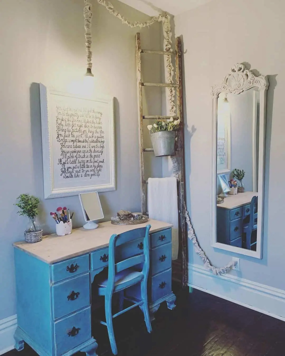 Vintage Ladder Adds Vertical Storage and Floral Accent
