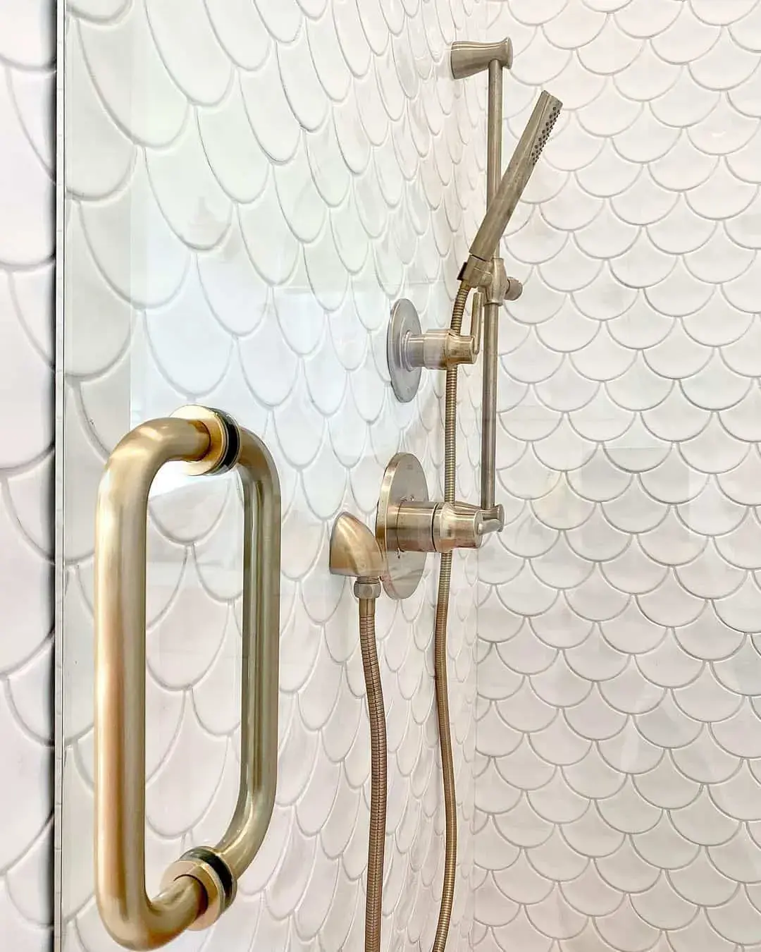 Fish Scale Tiles Add Organic Texture to a White Shower