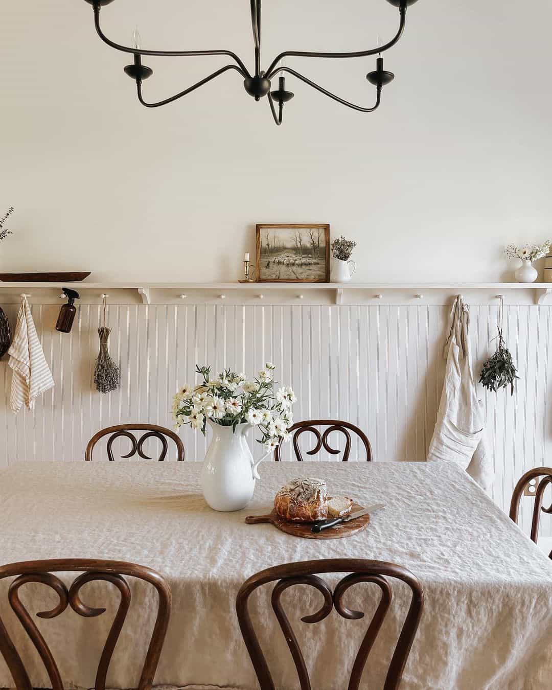 Pegged Shelf Displays Dried Herbs and Vintage Art