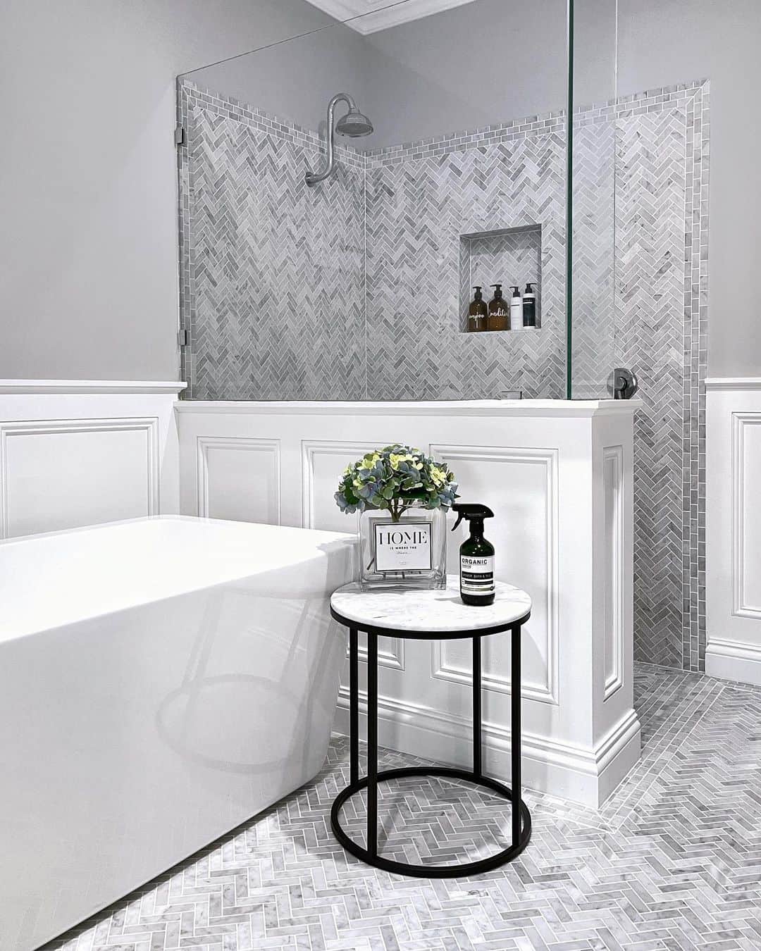 Introduce Patterned Texture with Herringbone Tile in a Shower