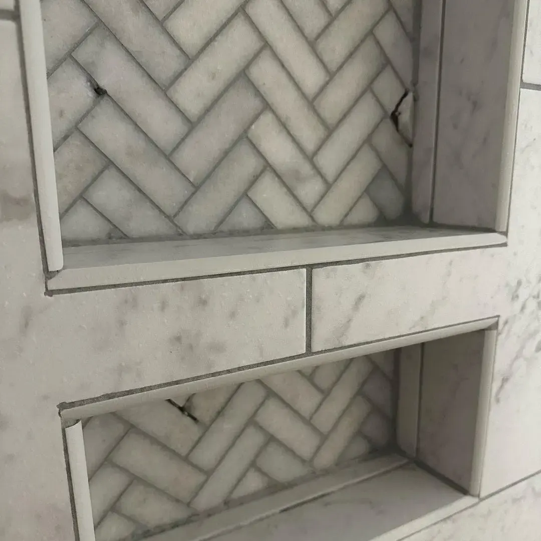 Incorporate Classic Marble Herringbone in Niches