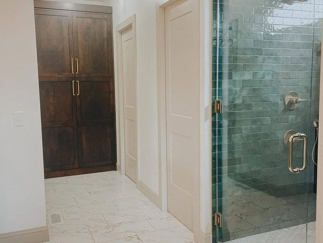 Deep Teal Subway Tile Adds a Rich Accent to the Shower