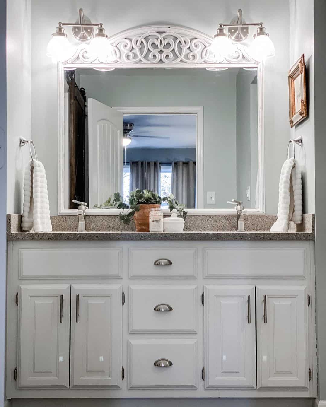 Ornate Mirror Frame Tops Double Sconces