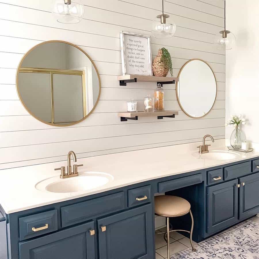 Glass Globe Pendants Offer Open-Air Illumination Above the Vanity