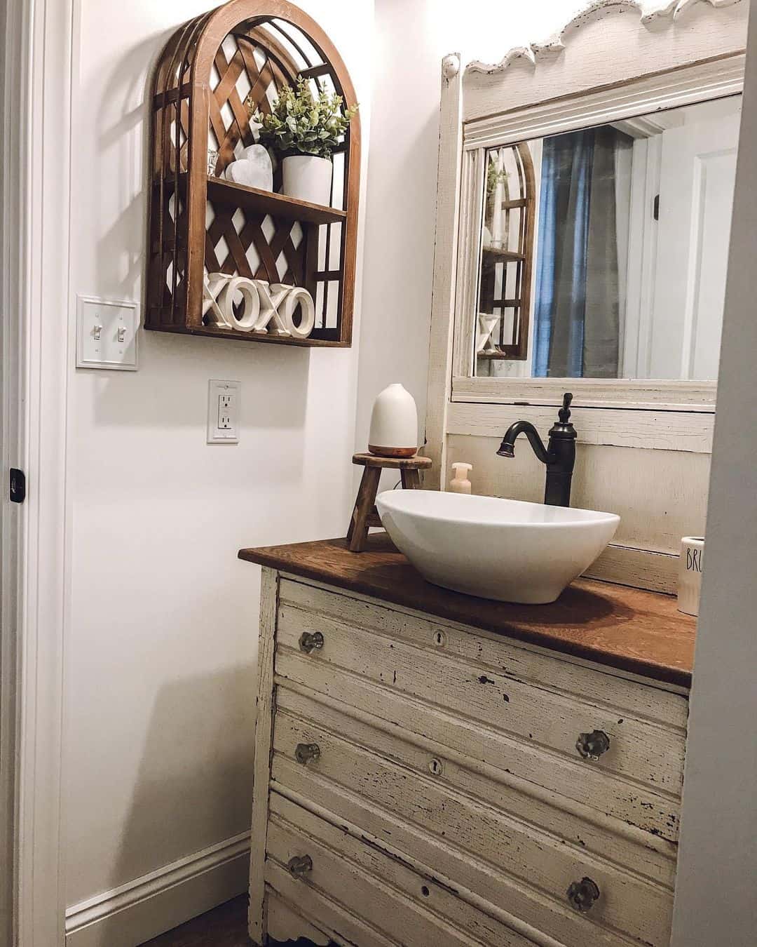 Arched Wooden Shelf Adds Open Storage Above the Vanity