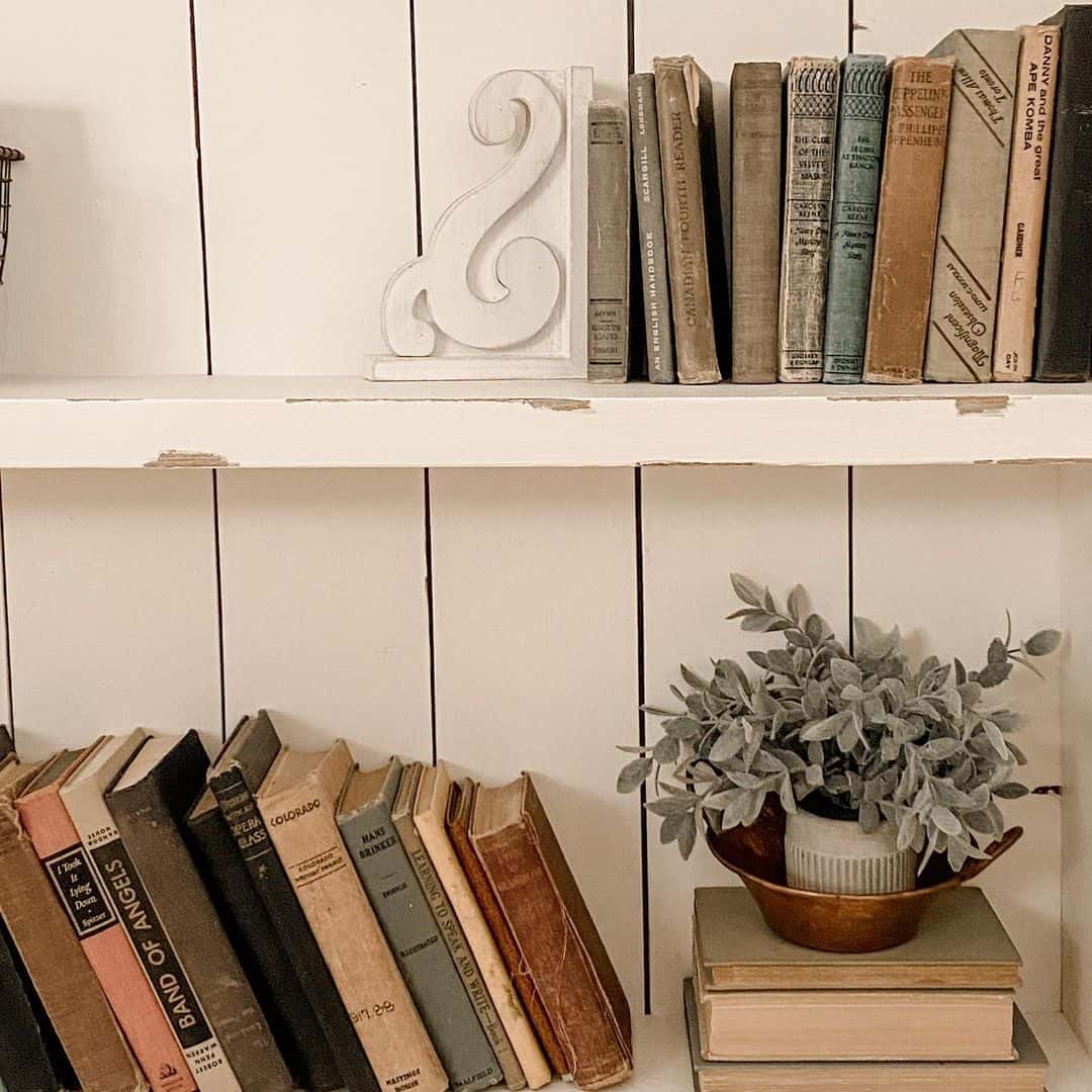 Adorn Shelves with Ornate White Bookends