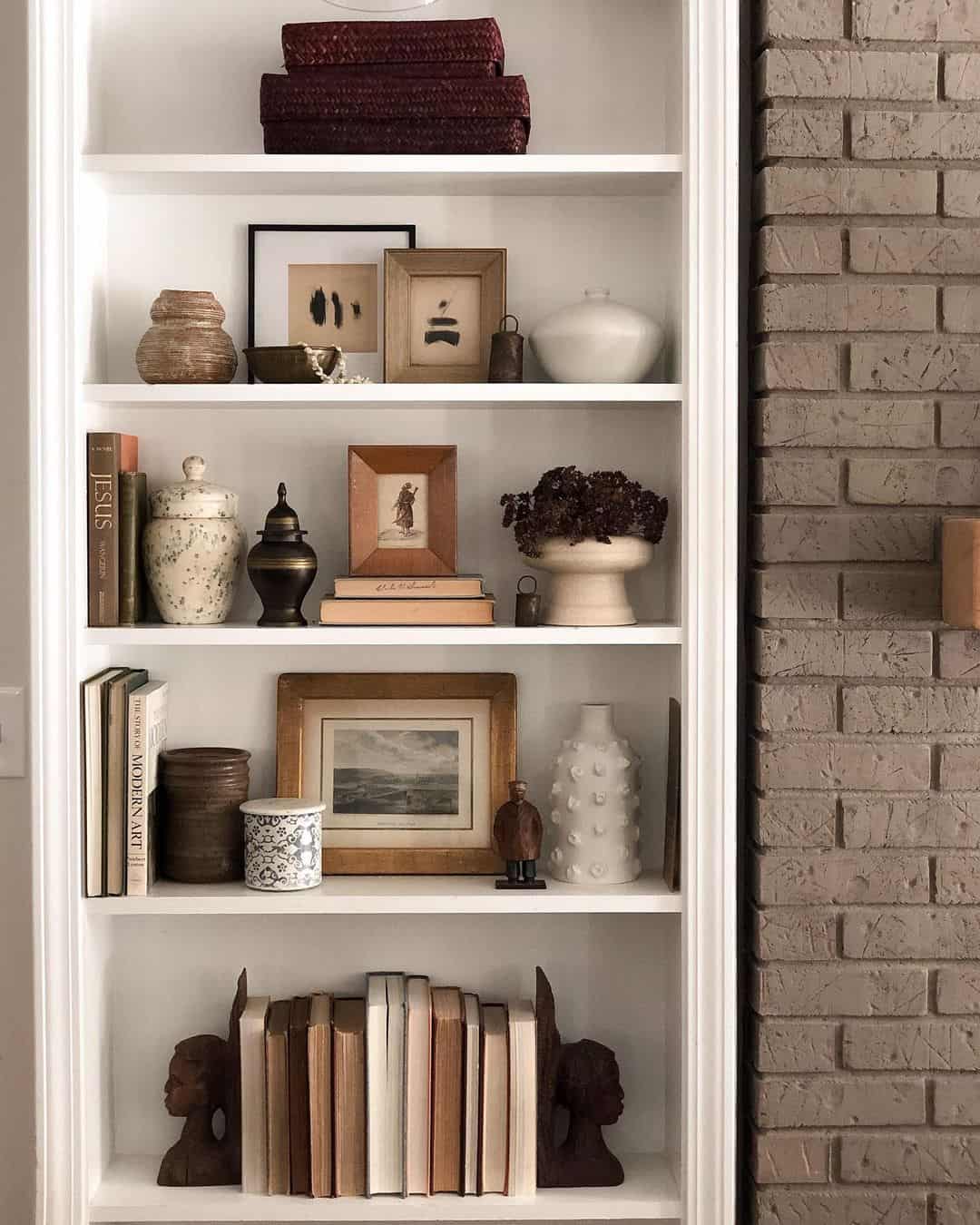 Frame Uniform Spines with Dark, Sculptural Bookends