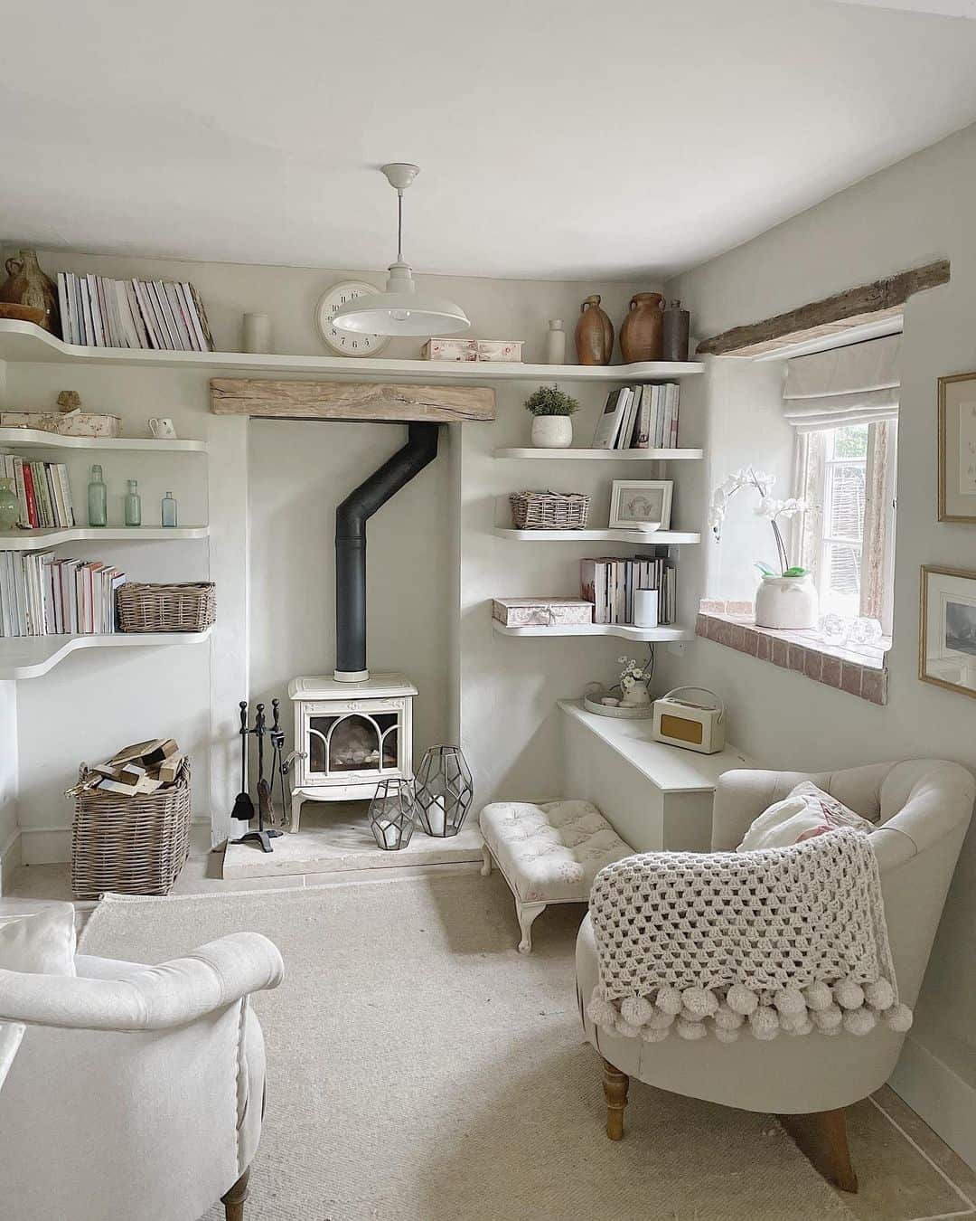 White Shelving With Woven Baskets Adds Cozy Texture