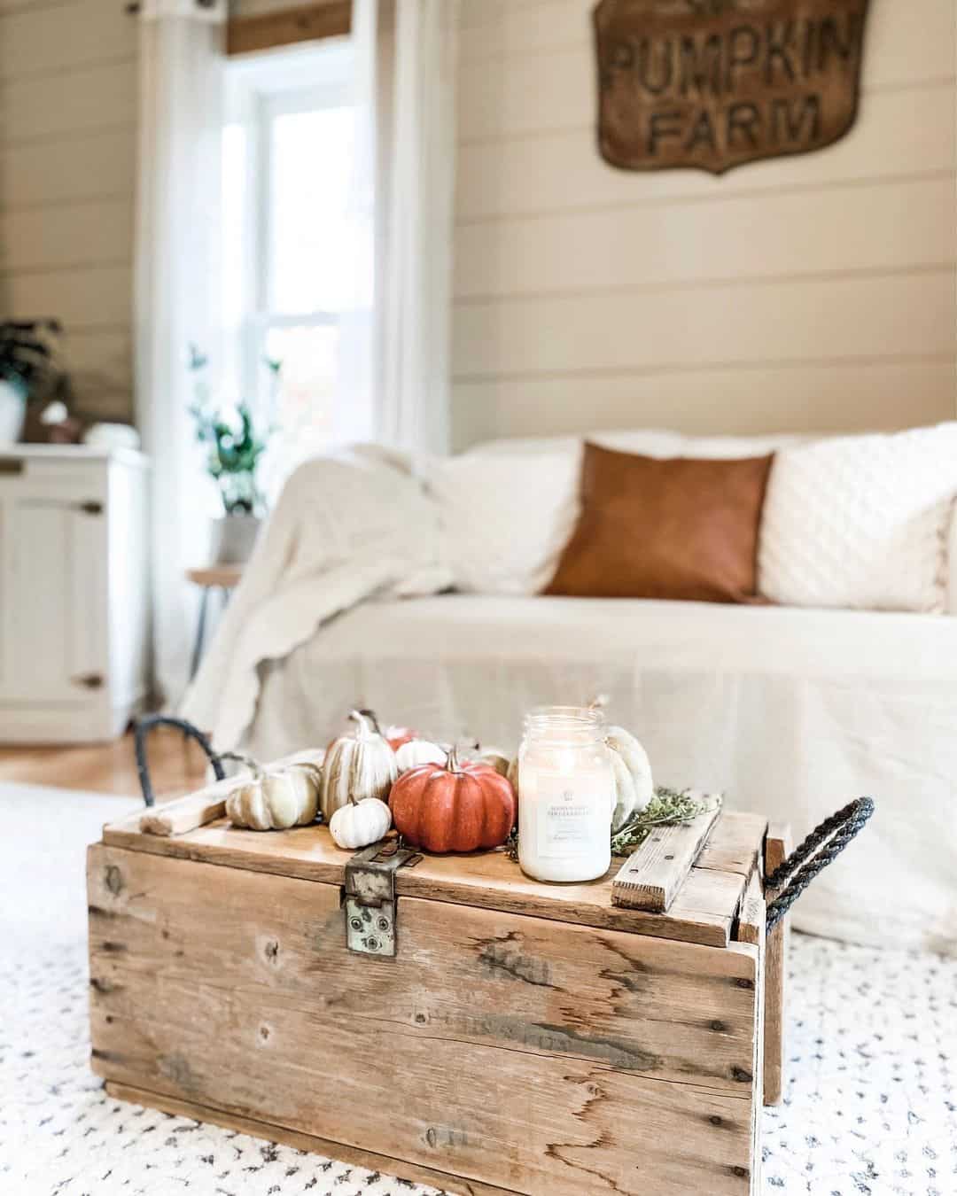 Group pumpkins and candles for a seasonal centerpiece