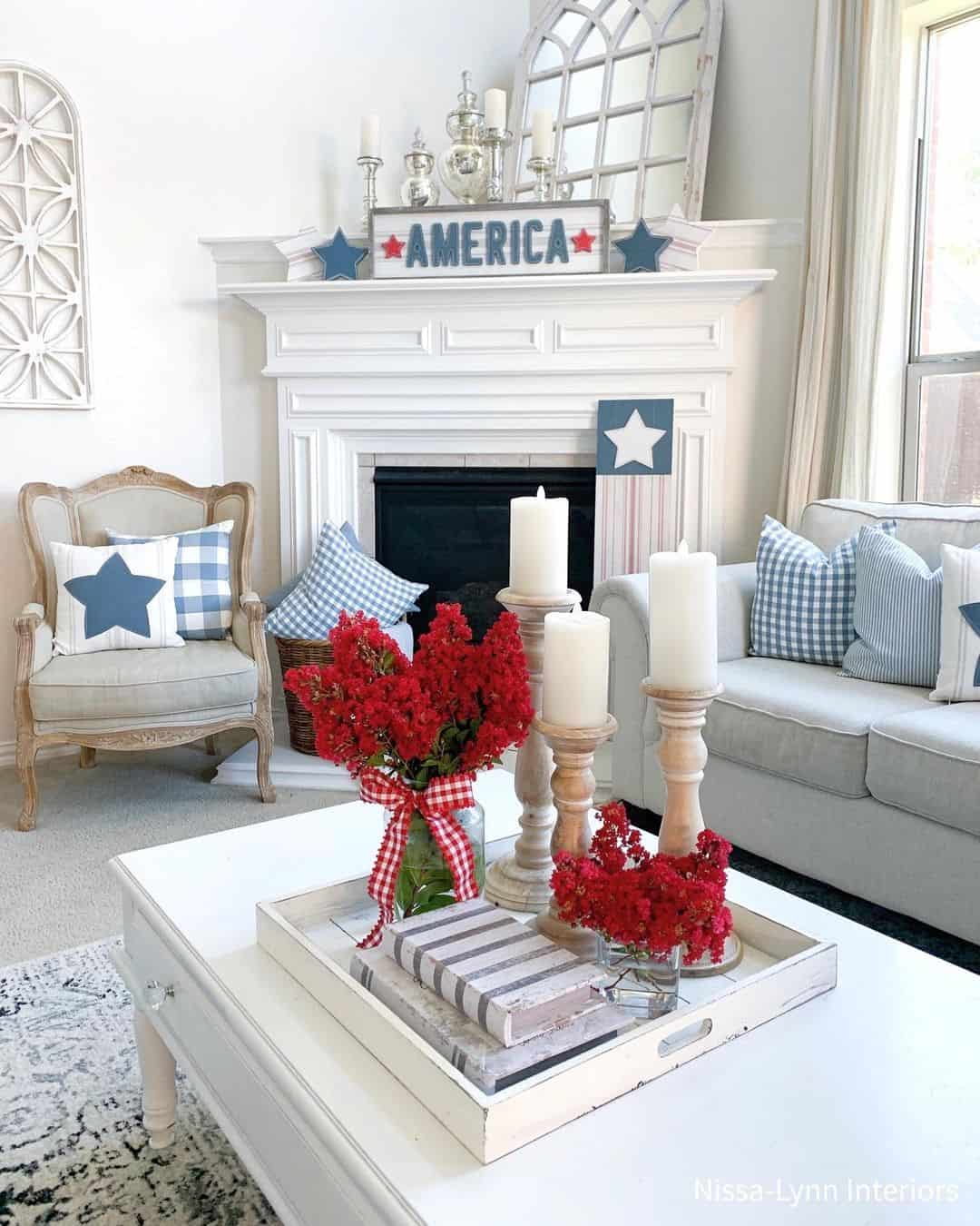 Wooden tray holds books and red blooms for a layered display
