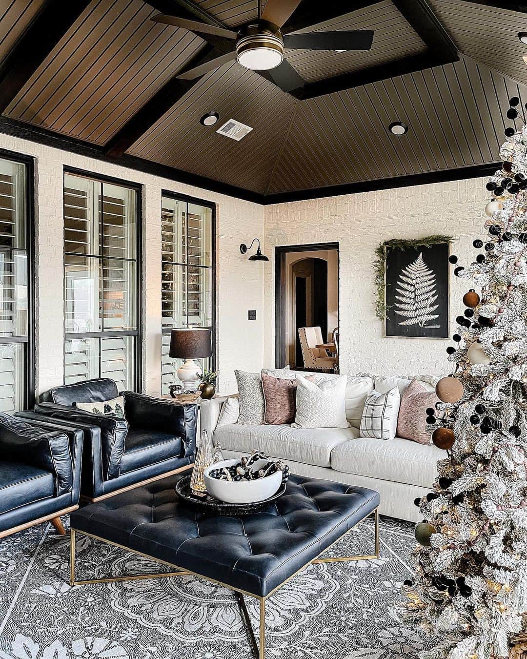 Black Tufted Ottoman with Gold Frame Adds Glamour