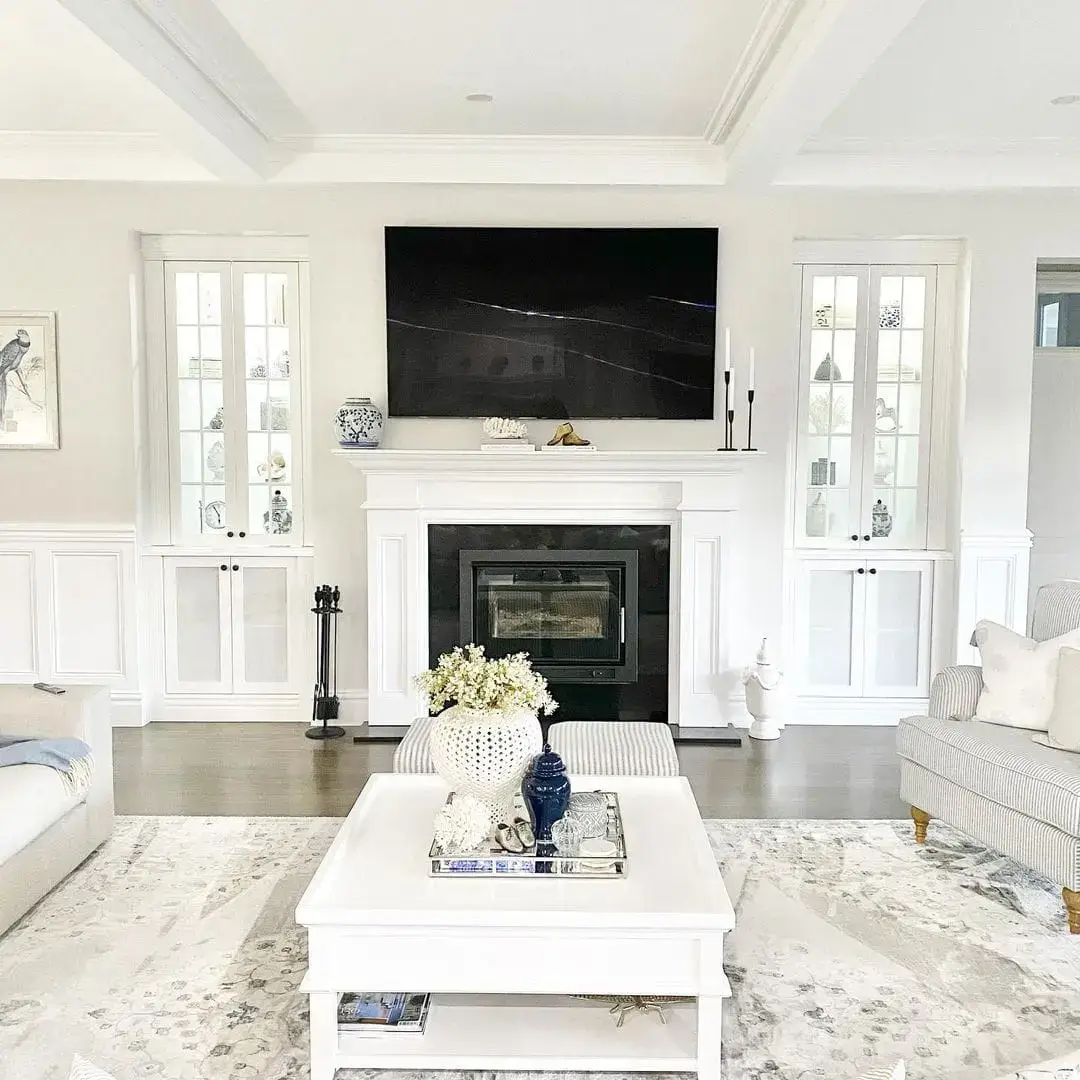 White Square Coffee Table Anchors a Layered Rug