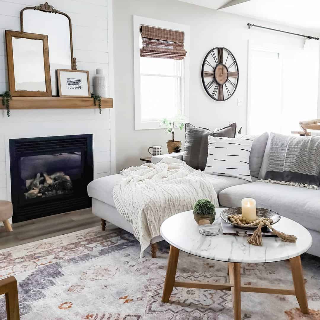 Marble-Top Round Table with Candle and Tassel Decor for Texture