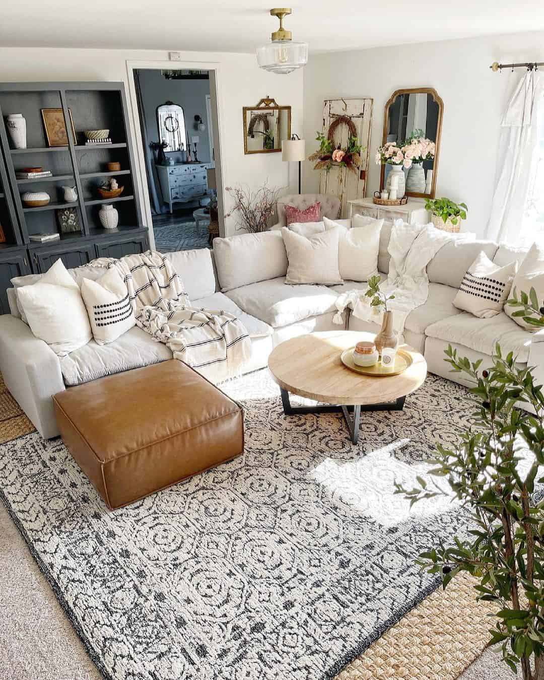 Warm, Inviting Touch: Light Wood Round Table with Gold Accents