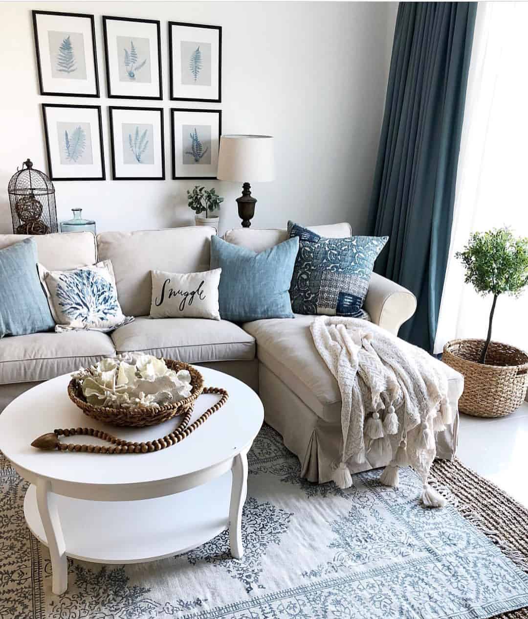 White Round Coffee Table With Tiered Shelf and Woven Bowl