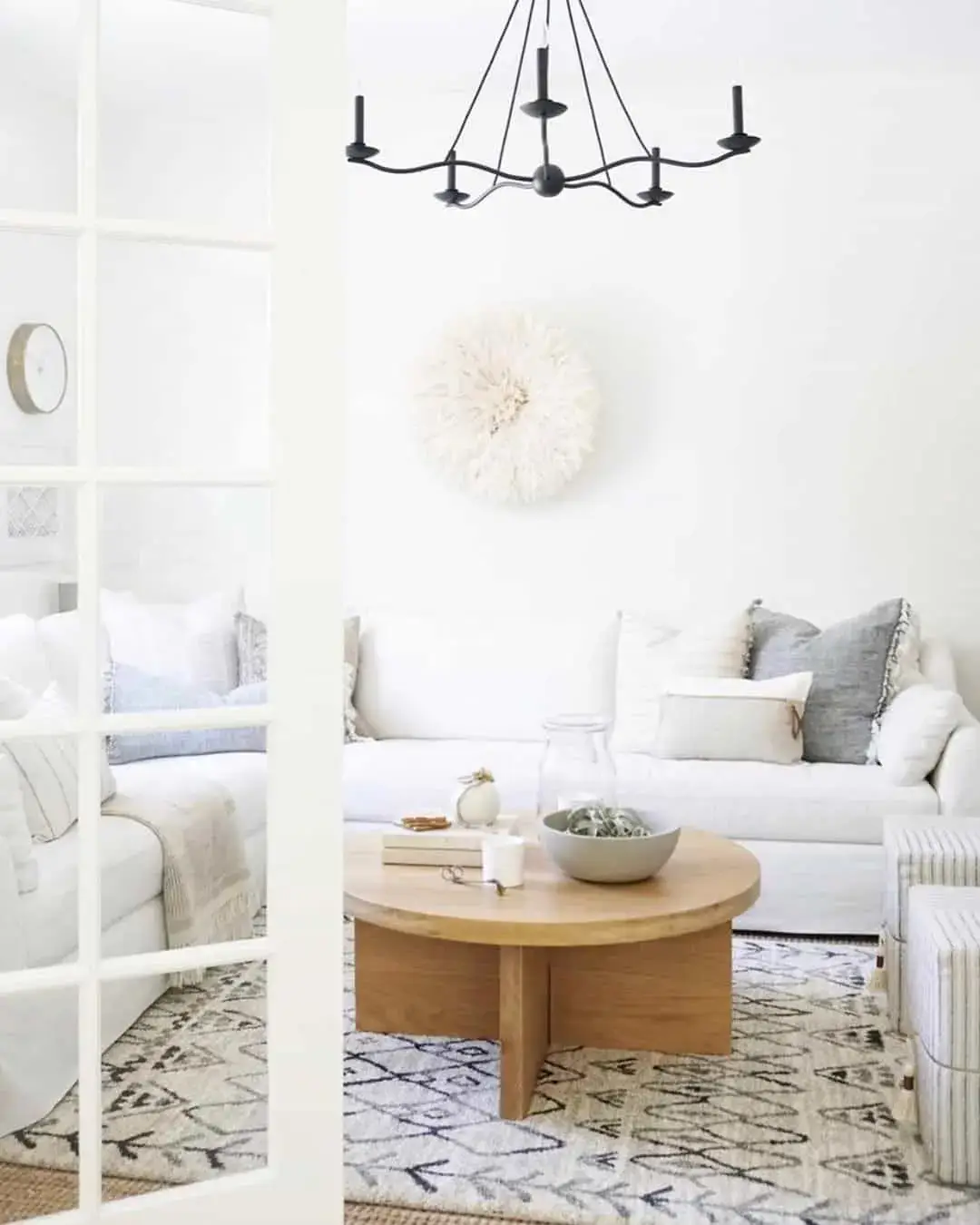 Ground Your Space with a Round Wood Table and Curated Vignette