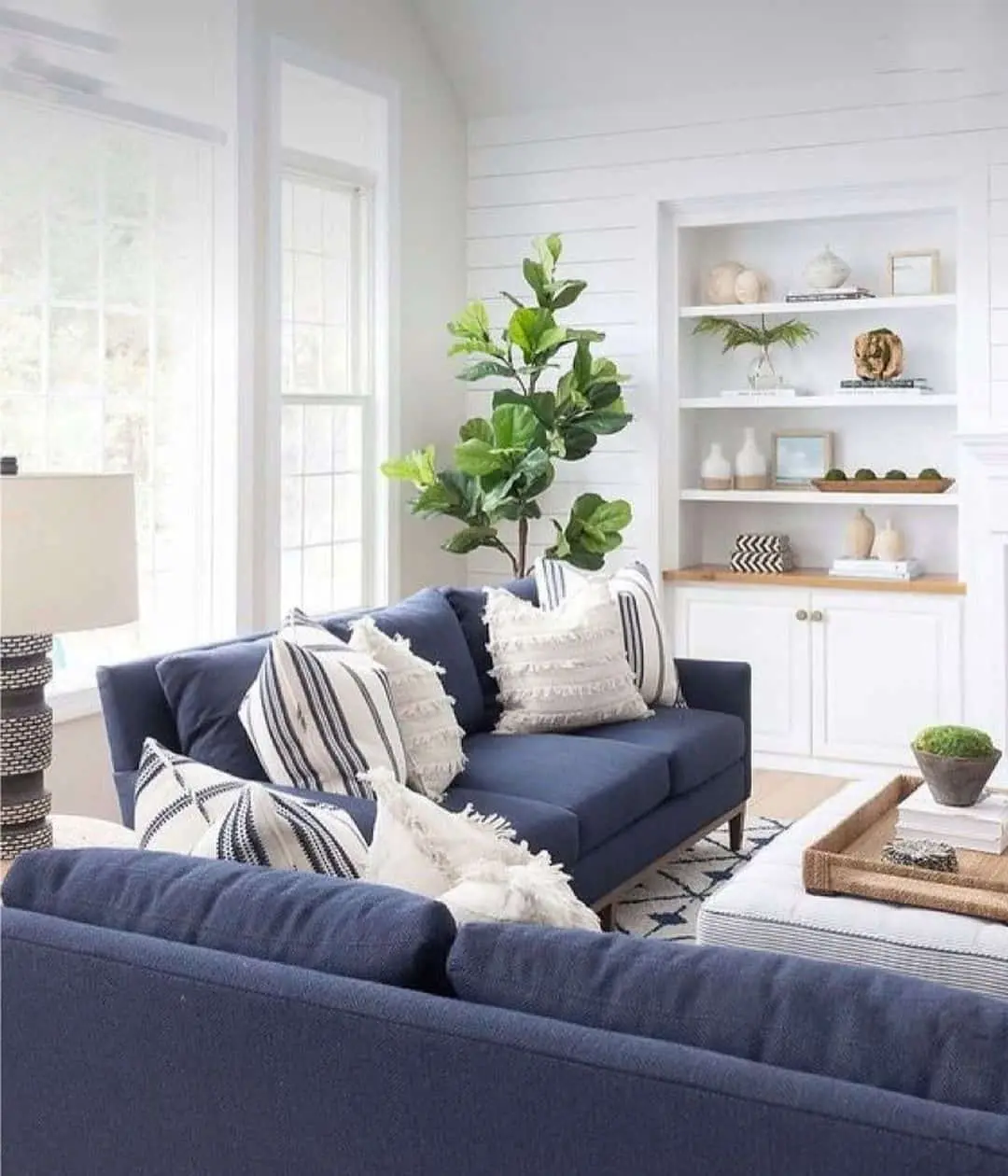 Soften Your Blue Sofa with Textured White Pillows