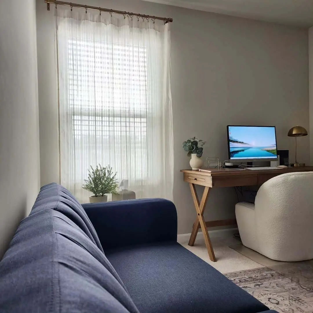 Anchor a Dark Blue Sofa with Subtle Geometric Rugs