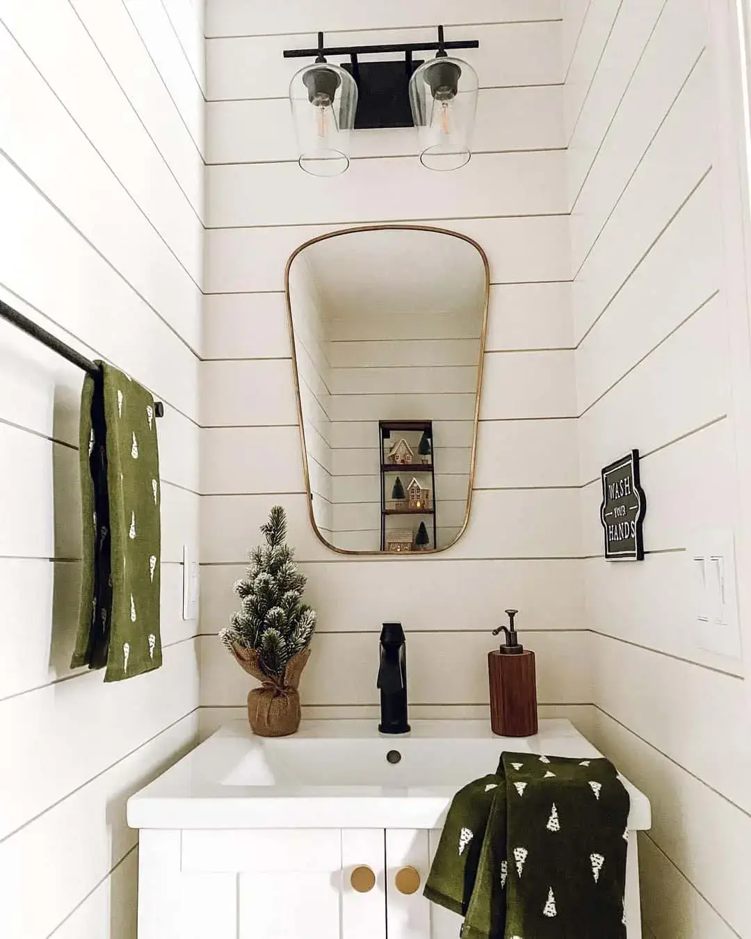 White Vanity with Brass Knobs and Round Gold Mirror
