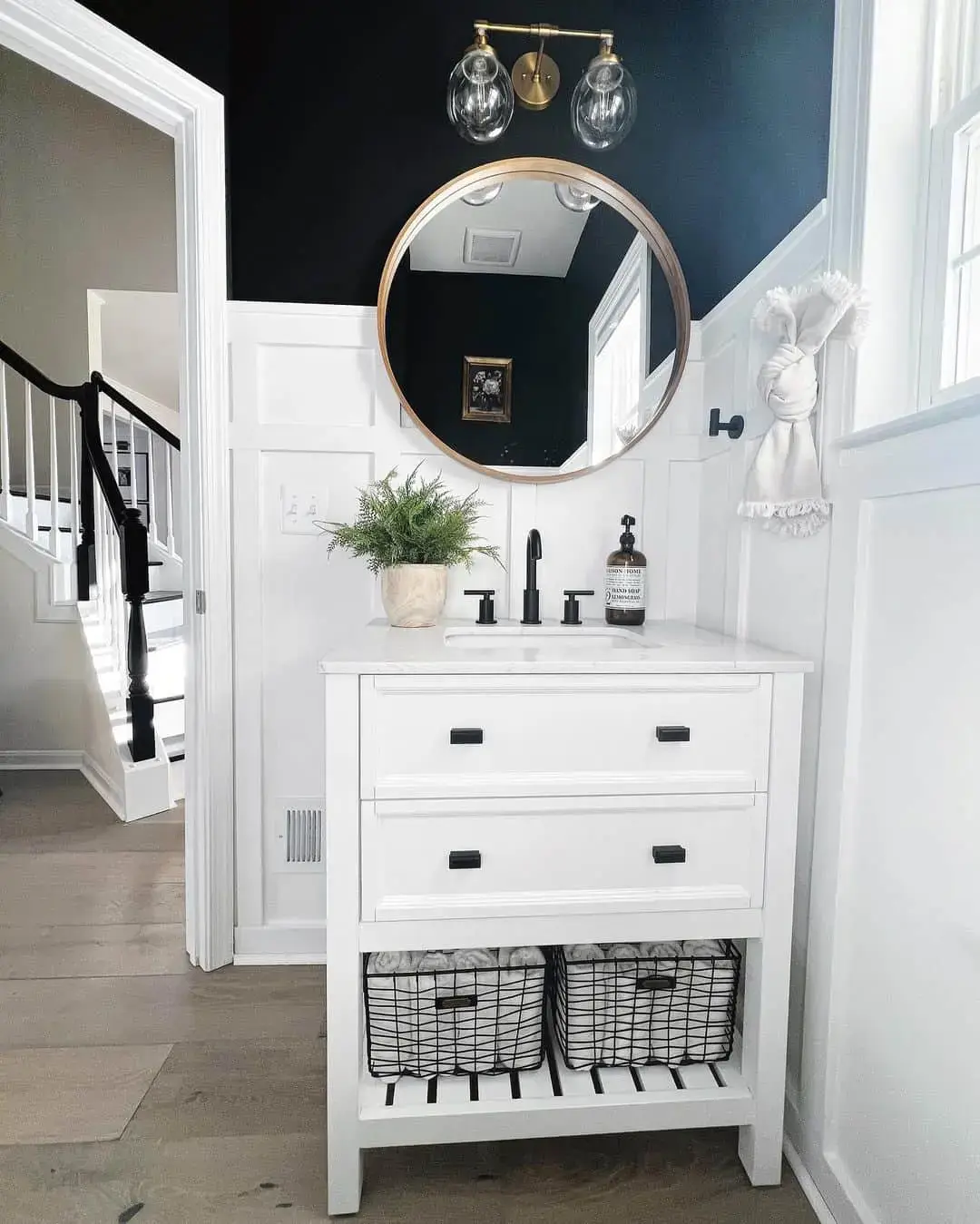 Wire Baskets Under a White Vanity for Open Storage