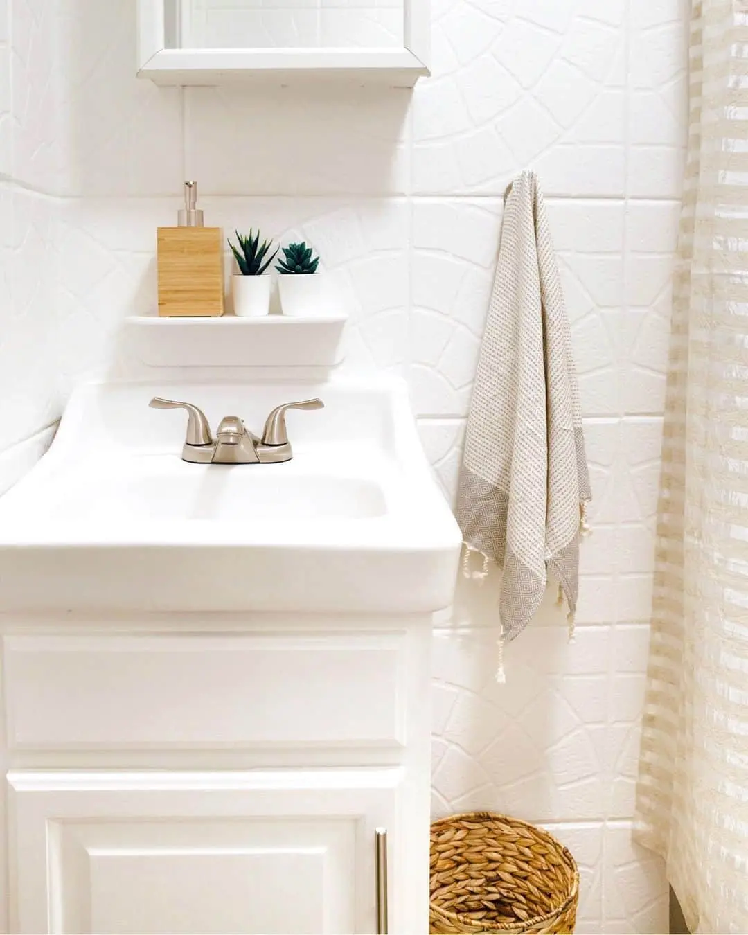 Minimalist Shelf Above a Slim White Vanity