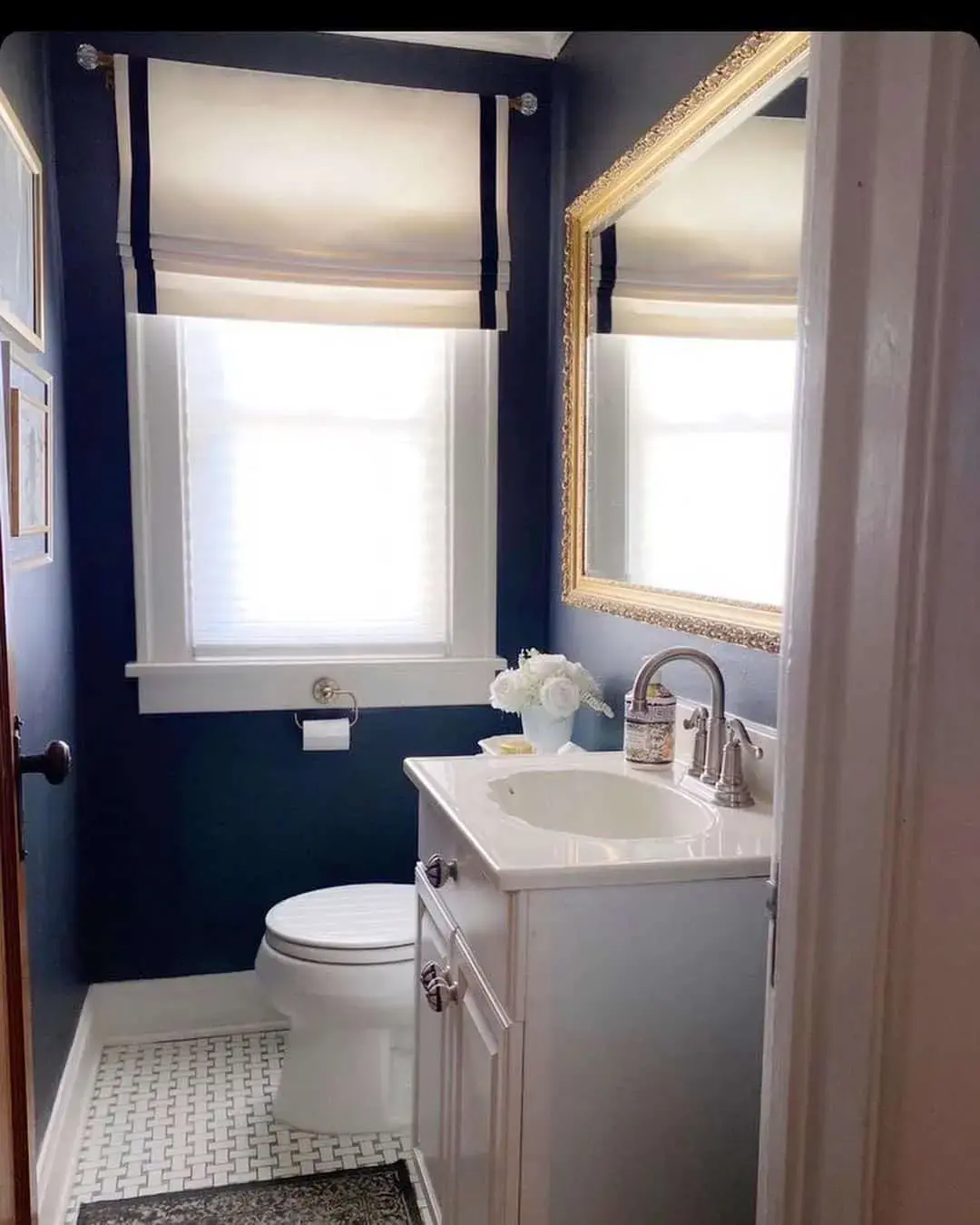White Vanity with Ornate Drawer Pulls and Marble Top