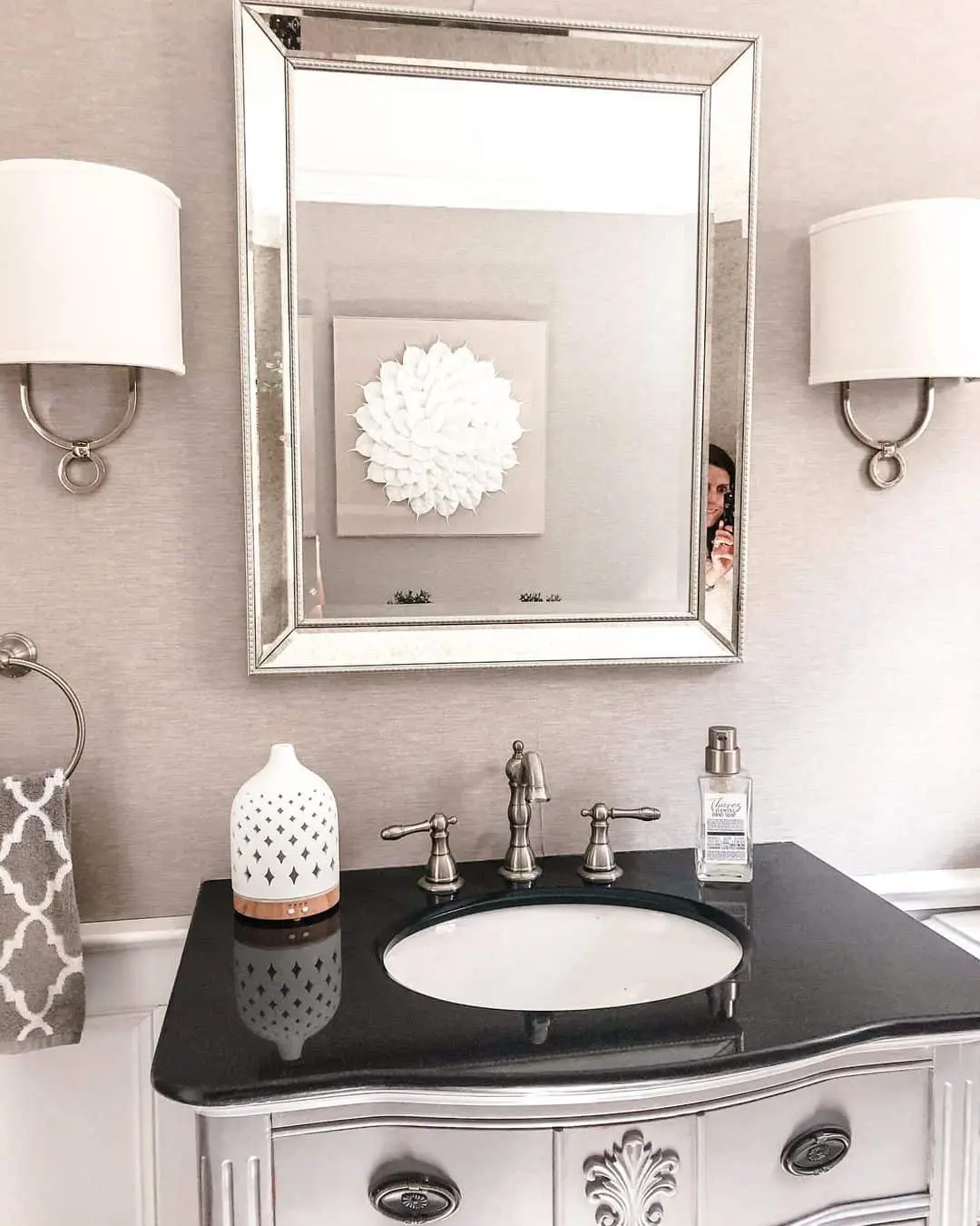Mirrored Vanity Frame Reflects Light and Art